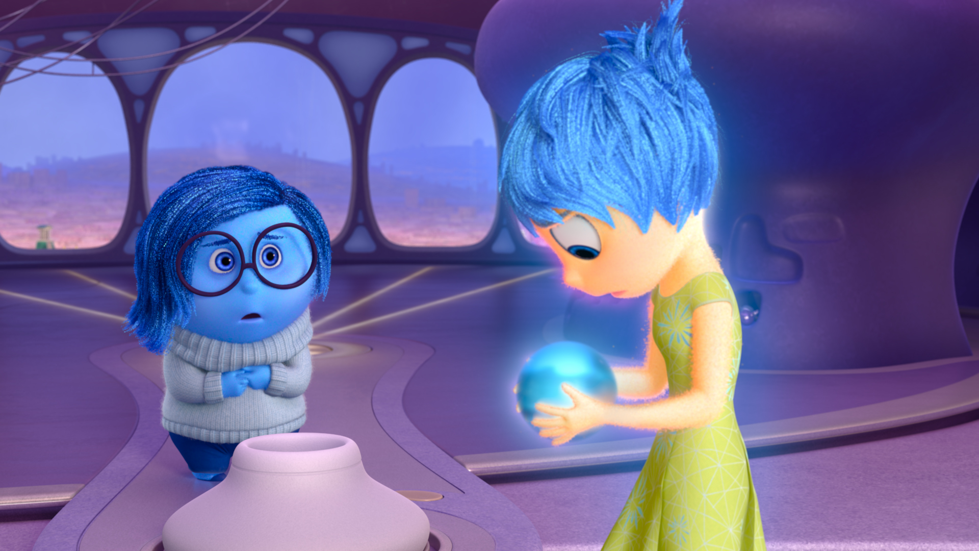 Pictured (L-R): Sadness, Joy. 2015 Disney Pixar. All Rights Reserved.